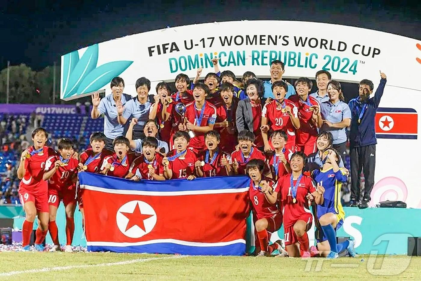 North Korea&#39;s Women&#39;s U17 National Football Team. Photo shows the team celebrating their championship win last year / Rodong Sinmun