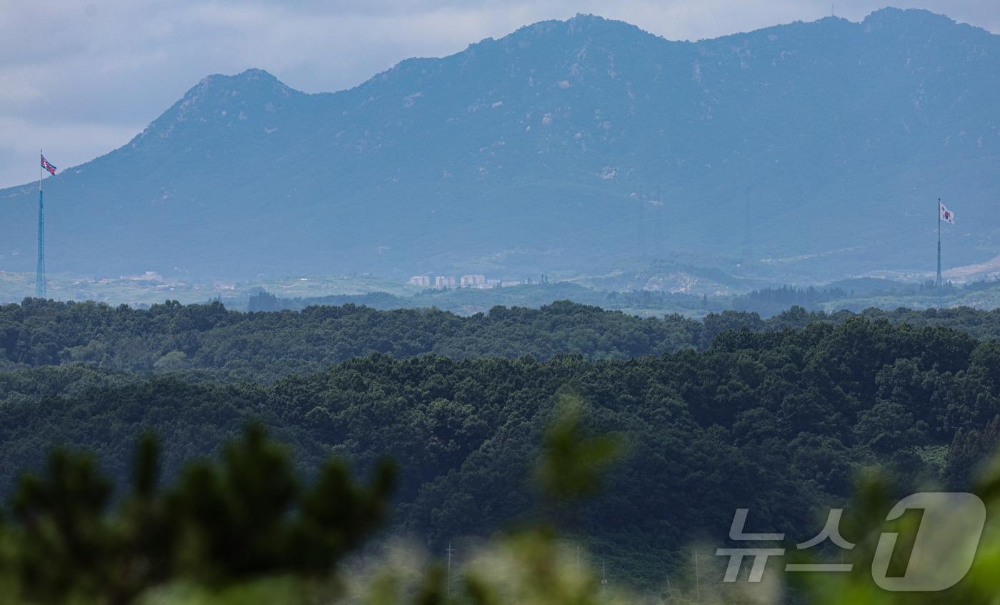 The South Korean flag &#40;right&#41; and North Korean flag &#40;left&#41; fly in the South Korean village of Daeseong-dong and the North Korean village of Gijeong-dong, respectively, within the Demilitarized Zone &#40;DMZ&#41; as seen from the border area in Paju City, Gyeonggi Province. 2024.7.24 / News1