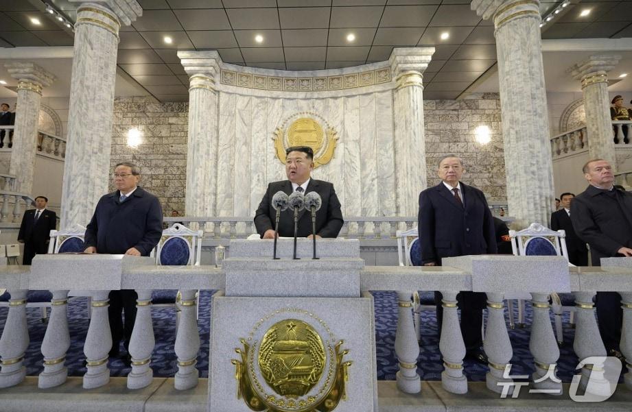 Kim Jong Un, General Secretary of the Workers&#39; Party of Korea, delivered a speech at a nighttime military parade held at Kim Il Sung Square in Pyongyang on October 10 to mark the 80th anniversary of the party&#39;s founding. Standing from left are Li Chang, Premier of the State Council of China; Kim Jong Un, General Secretary of the Party; Nguyen Phu Trong, General Secretary of the Communist Party of Vietnam; and Dmitry Medvedev, Deputy Chairman of the Security Council of Russia / Rodong Sinmun