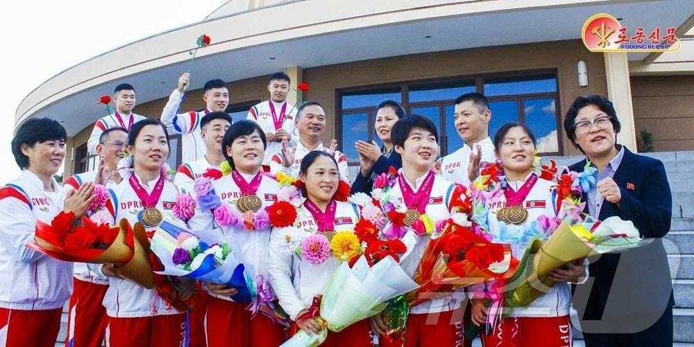 The Rodong Sinmun, the official newspaper of North Korea's Workers' Party, reported on Thursday that the country's athletes who won medals at the IWF World Championships once again brought glory to the homeland / Rodong Sinmun