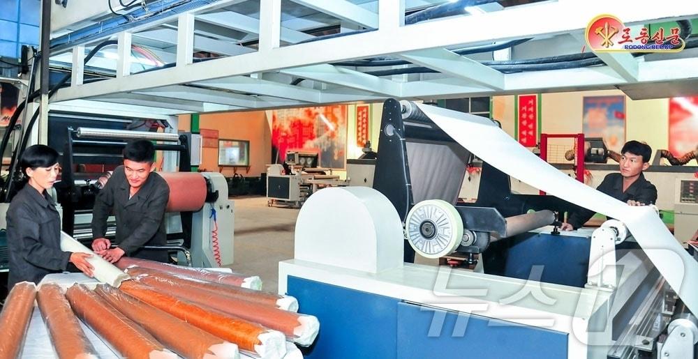 The Rodong Sinmun, the official newspaper of North Korea&#39;s Workers&#39; Party, highlighted the Pyongyang Suji Building Materials Factory on Tuesday, stating it is striving to produce high-quality building materials / Rodong Sinmun