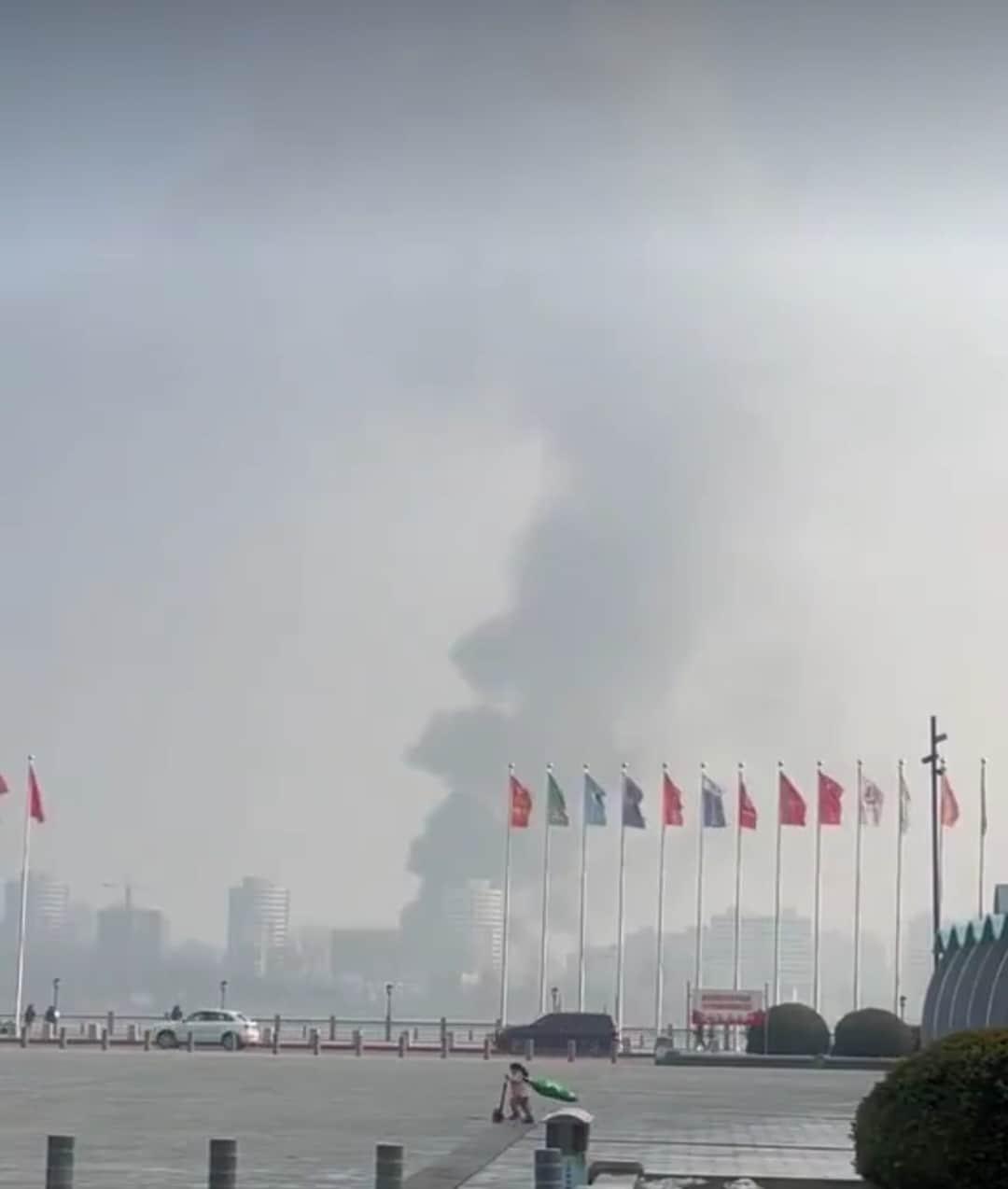 On December 7, footage showing smoke rising over Sinuiju, North Korea, across the Yalu River, was posted on X (formerly Twitter) from a square in Dandong, Liaoning Province, China, near the North Korea-China border / Capture from X