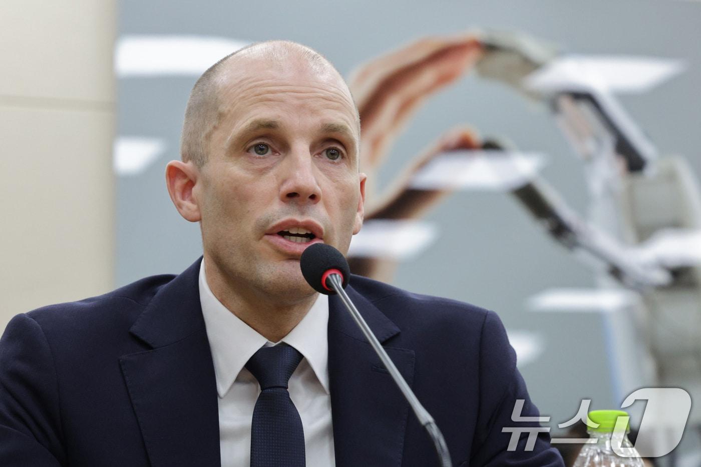 Harold Rogers, Coupang's interim CEO, answers lawmakers' questions during a hearing on the Coupang security breach held at the National Assembly's Science, Information and Communications Technology (ICT), Broadcasting, and Communications Committee in Yeouido, Seoul, on Wednesday. 2025.12.17 / News1
