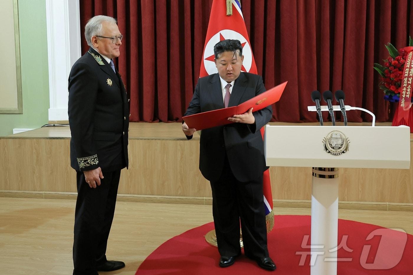 North Korean leader Kim Jong Un and Russian Ambassador to North Korea Aleksandr Matsegora. / Rodong Sinmun