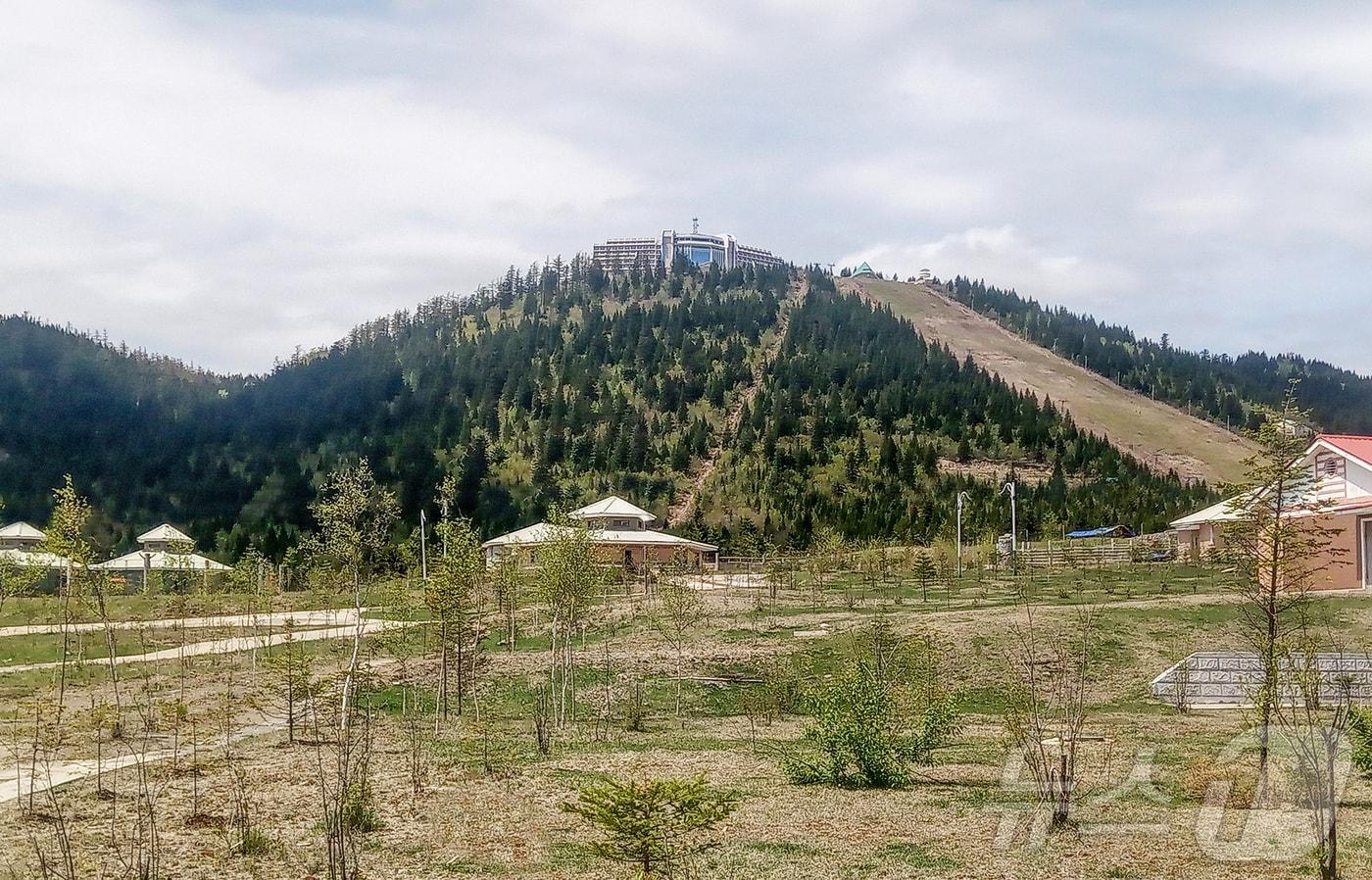 Volcanic features of the Paektu Mountain area, newly designated as a UNESCO Global Geopark, include Ganbaeksan, Beigaebong, Soyeonjibong Small Volcano, and Mudubong Volcano. / Rodong Sinmun