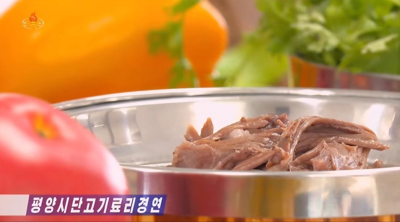 The Pyongyang Dog Meat Cooking Competition was held at Hwasong-gak in Pyongyang / Capture from Korean Central Television