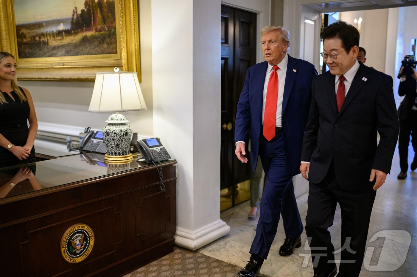 South Korean President Lee Jae Myung walks after being received by U.S. President Donald Trump at the entrance of the White House in Washington, August 25. 2025.08.31 &#40;Provided by the White House&#41; / News1