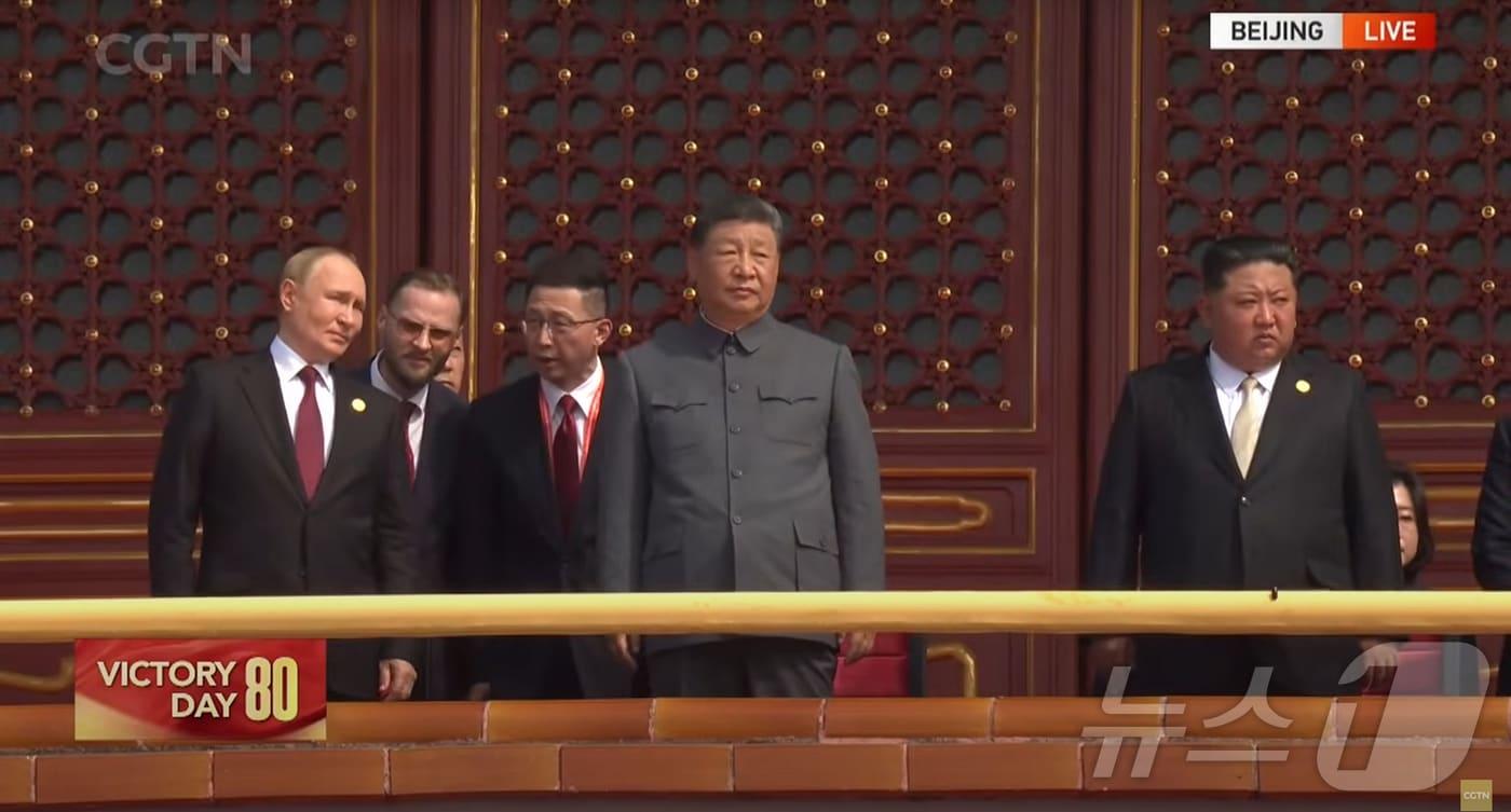 Chinese President Xi Jinping, North Korean Workers&#39; Party General Secretary Kim Jong Un, and Russian President Vladimir Putin watch a military parade at Tiananmen Square in Beijing, China, on Wednesday during the 80th anniversary event of Victory Day &#40;commemorating the victory in the War of Resistance Against Japanese Aggression and the War Against Fascism&#41;. &#40;Capture from China&#39;s CGTN&#41; 2025.9.3 / News1