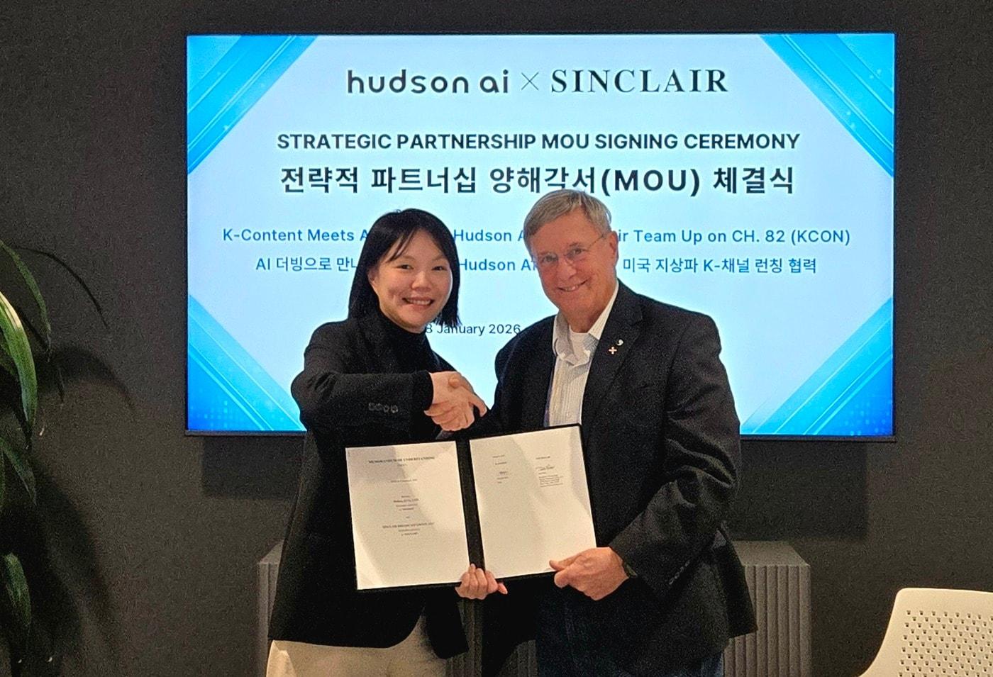 Shin Hyun-jin, CEO of Hudson AI (left), and Del Parks, President of Technology at Sinclair Broadcast Group, signed a strategic business agreement to collaborate on launching a K-content channel utilizing AI dubbing technology / Provided by Hudson AI