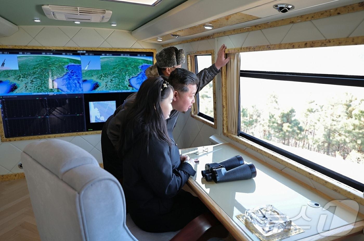 Kim Jong Un, General Secretary of the Workers' Party of Korea, and his daughter Ju-ae attended the test firing of a large-caliber multiple rocket launcher system conducted by the Missile Bureau on Tuesday / Rodong Sinmun