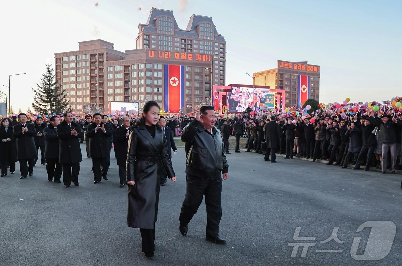 Kim Jong Un, General Secretary of the Workers' Party of Korea, and his daughter Ju Ae attending the completion ceremony for 10,000 residential units in Phase 4 of the Hwasong District on February 16, 2026 / Rodong Sinmun