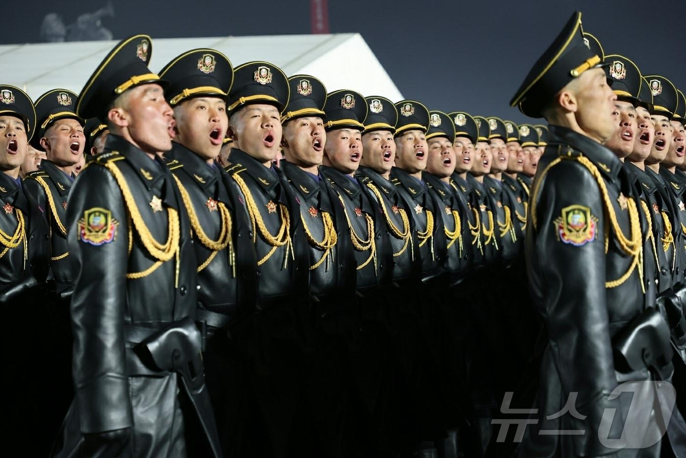 North Korean soldiers march during a military parade held on February 25 to commemorate the closing of the 9th Workers' Party Congress / Rodong Sinmun