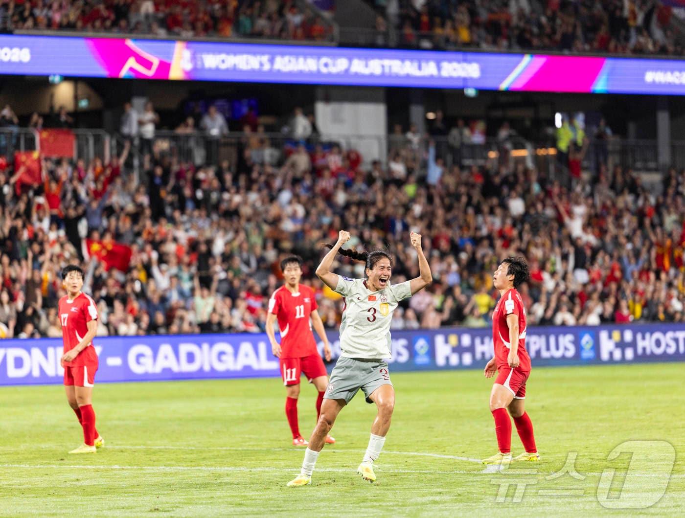 North Korea's women's soccer team advanced to the quarterfinals of the Women's Asian Cup as group runners-up after losing to China / News1
