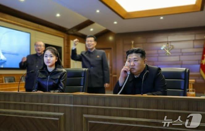 On Tuesday, Kim Jong Un, General Secretary of the Workers' Party of Korea, and his daughter Ju-ae observed the test launch of the strategic cruise missile / Rodong Sinmun