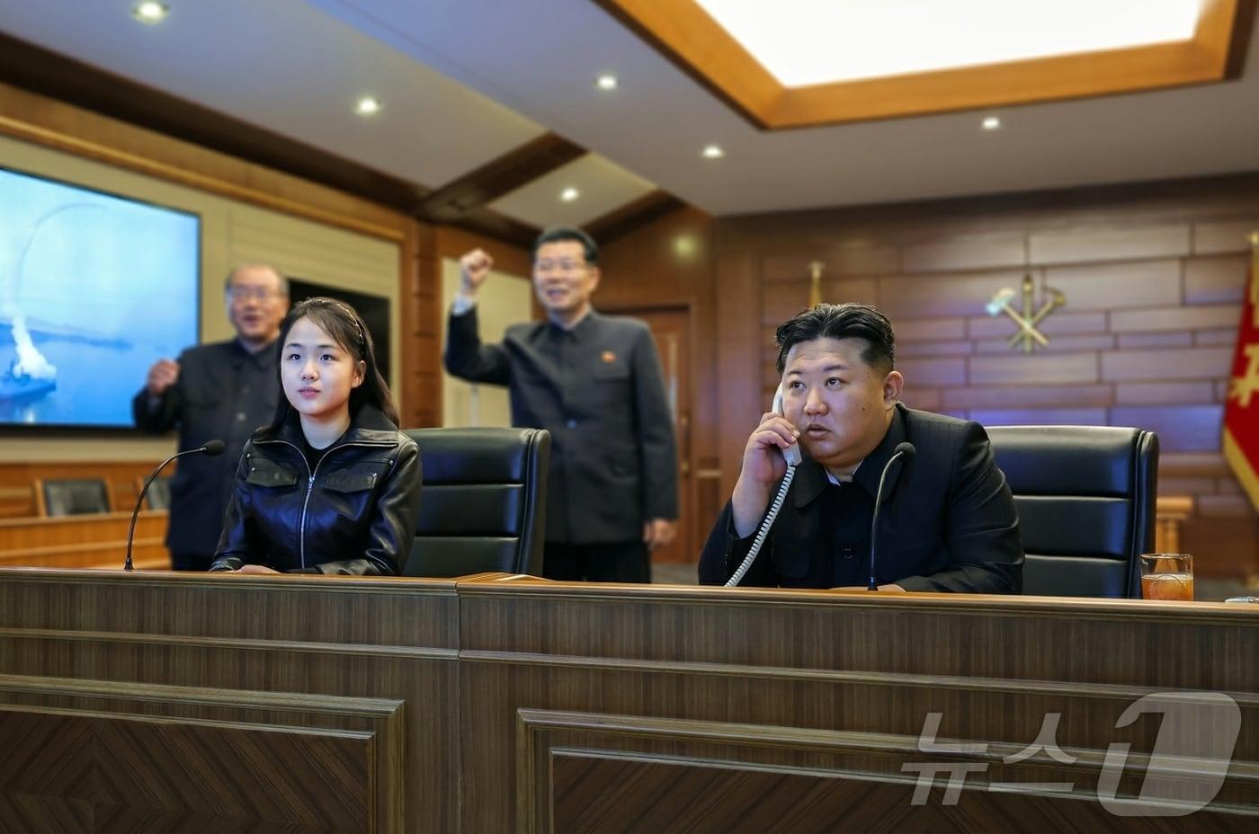 The Rodong Sinmun, the official newspaper of North Korea's Workers' Party, reported on Wednesday that another test launch of a strategic cruise missile was conducted from the destroyer Choe Hyon Ho on Tuesday. Kim Jong Un, the Party's General Secretary, and his daughter Ju Ae observed the test launch via video / Rodong Sinmun