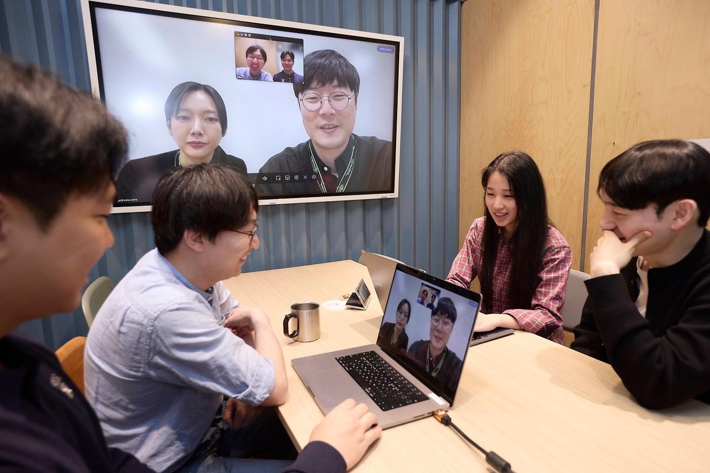 AI model developers at SK Telecom’s Euljiro headquarters hold a remote meeting with NVIDIA representatives. / Courtesy of SK Telecom