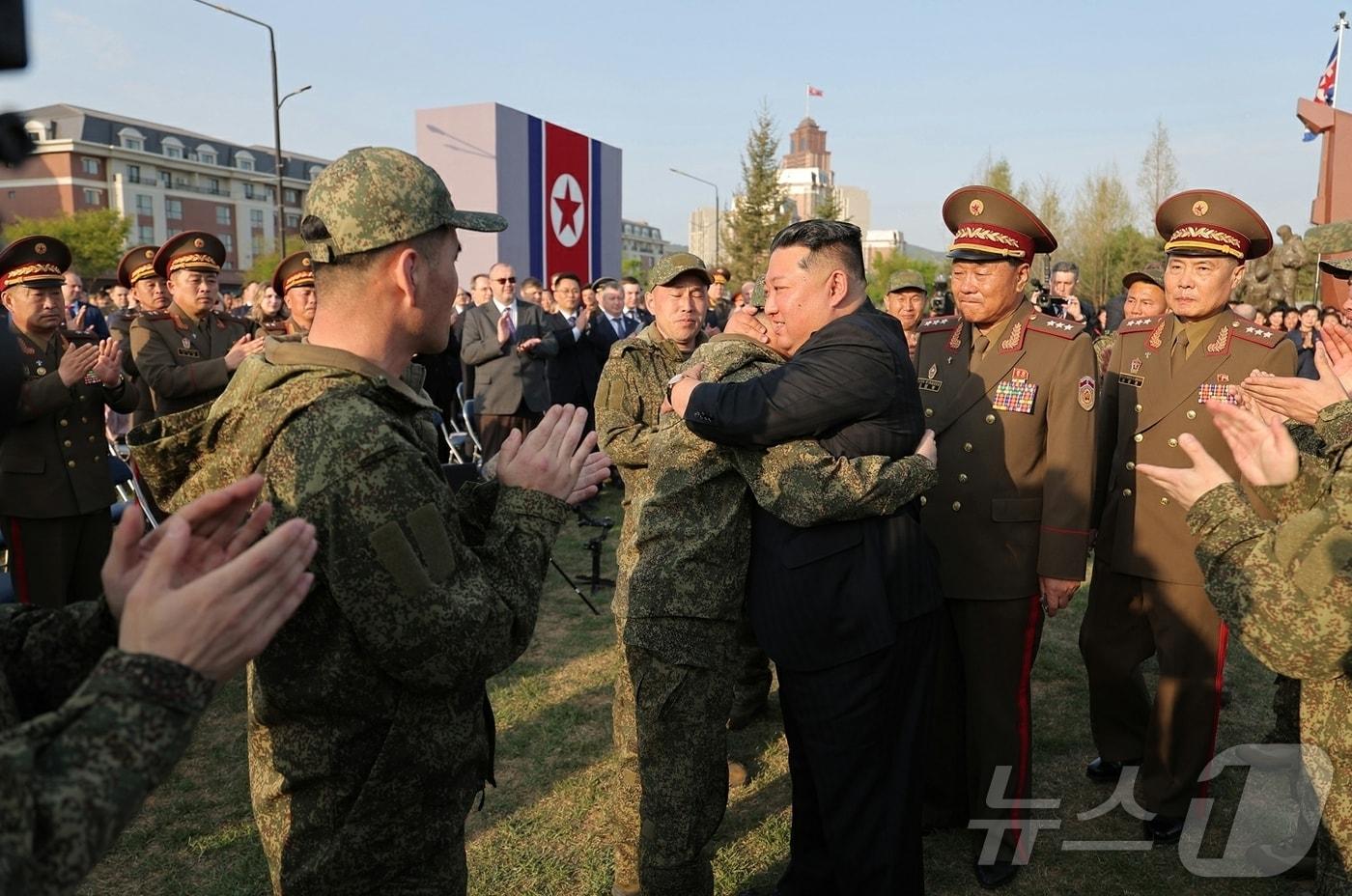 North Korean leader Kim Jong Un embraces and consoles troops dispatched to Russia during a ceremony marking the completion of the “Overseas Military Operations Combat Feats Memorial Hall” in Pyongyang on April 26 local time. [For Use Only in the Republic of Korea. Redistribution Prohibited] / Courtesy of News1