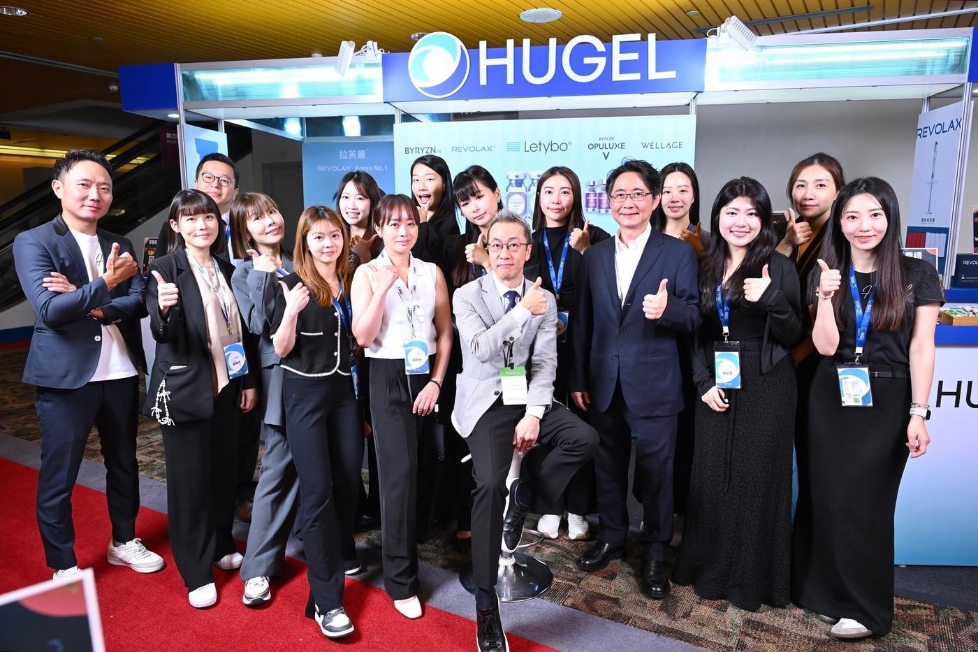 Hugel Taiwan employees posing for a commemorative photo at the AMWC ASIA & TDAC 2026 event / Provided by Hugel