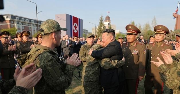 Kim Jong Un says even those who failed to self-destruct are “party soldiers,” message seemingly aimed at POWs